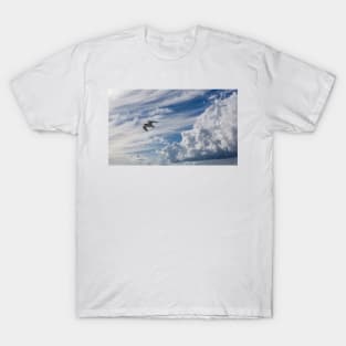 White seagull flying in bright blue sky T-Shirt